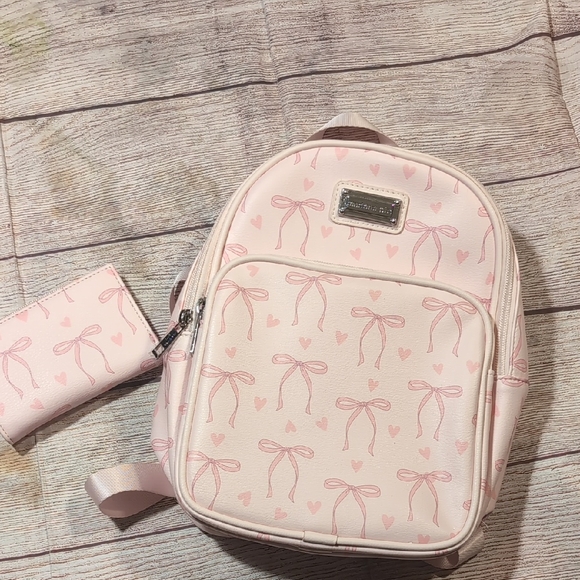 Madden Girl Handbags - Madden Girl Pink With Bow Detail Mini Backpack & Matching Wristlet